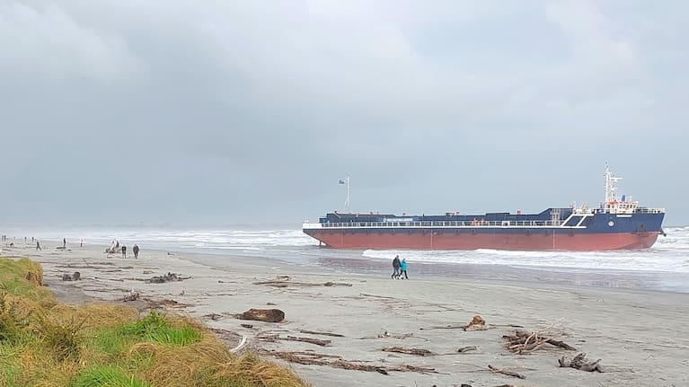 A barge run aground on Carters Beach near Westport.