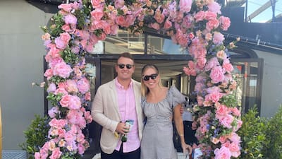 A couple enjoying race day at Pukekohe Park. Credit: Auckland Thoroughbred Racing.