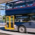 A file photo of a double-decker bus passing by a Northern Busway station in Auckland.