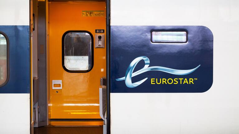 A Eurostar train with an open door.