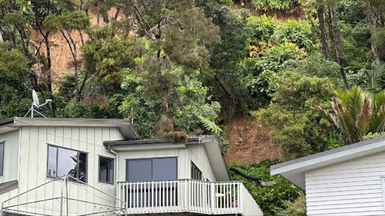 A landslip has gone through a home on Scenic Dr, Swanson.