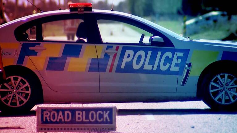 A New Zealand Police vehicle with a road block in place (file image)