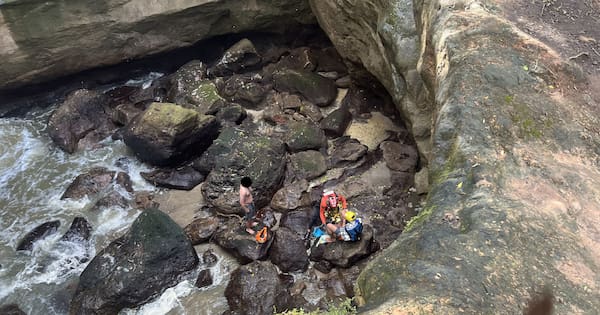 Rescue of pair from blowhole diverted after bystander falls in