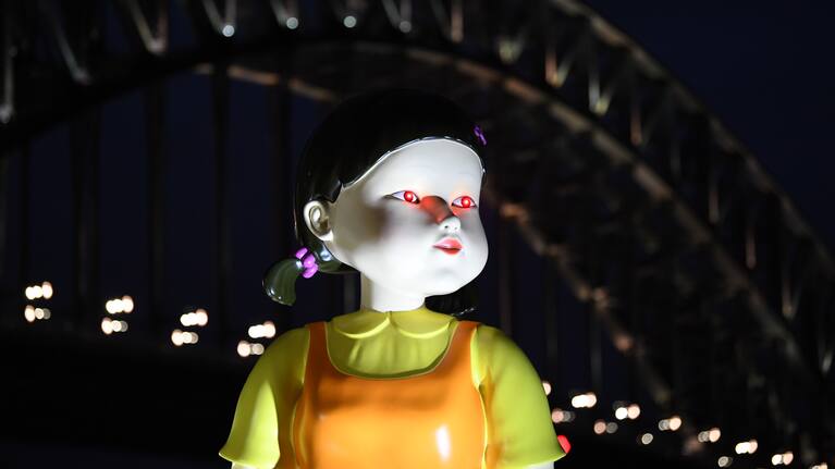 A replica animated doll from the Netflix series Squid Game installed at Sydney Harbour for Halloween.