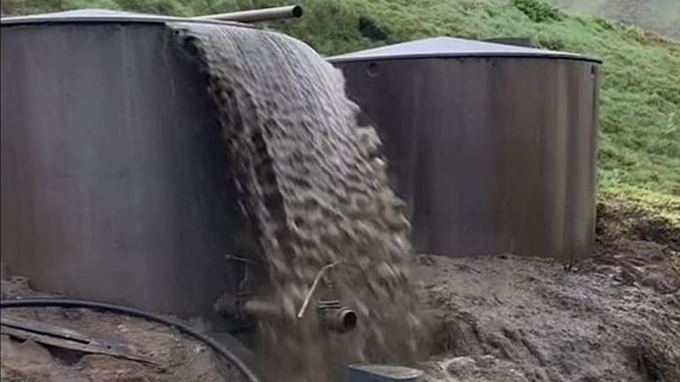 A screenshot of a video taken by Waikato Regional Council in 2023 shows effluent overflowing from a holding tank into a stream north of Te Aroha.