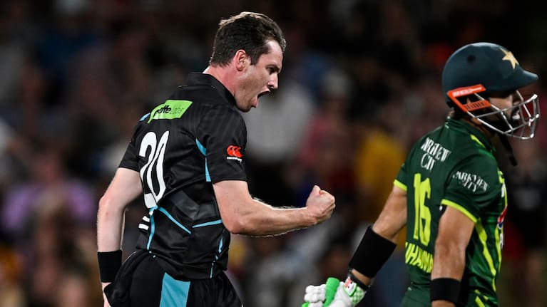 New Zealand bowler Adam Milne celebrates the wicket Mohammad Rizwan.