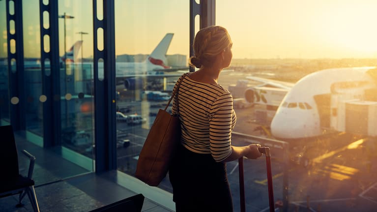 Woman waits to get on a plane (file photo).