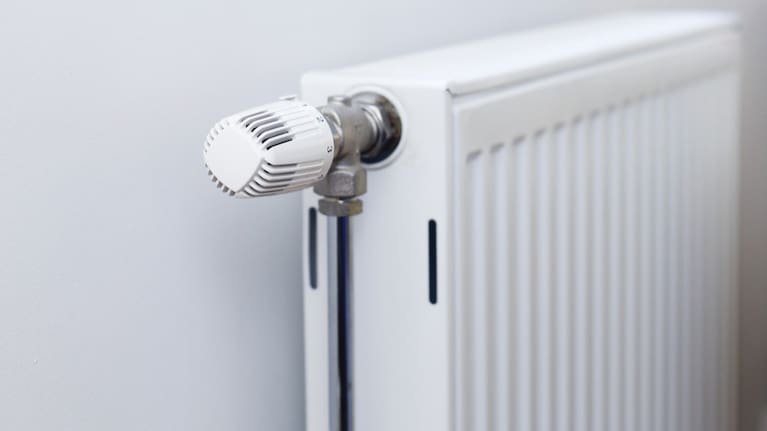 An example of a panel heater attached to a wall in the bedroom.