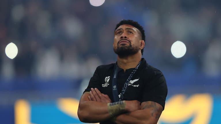 A dejected Ardie Savea wears a silver medal after a gold medal performance in the World Cup final.