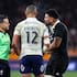 Ardie Savea speaks to referee Nic Berry, with France skipper Gael Fickou in attendance, as Billy Proctor's try is overturned.