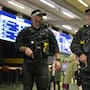 Armed police officers patrol the St Pancras International train station, in London, England.