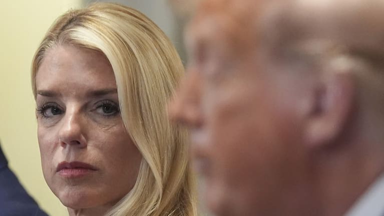 Attorney General Pam Bondi, left, listens as President Donald Trump, right, speaks during a cabinet meeting at the White House, Tuesday, July 8, 2025, in Washington.