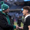 Beauden Barrett shakes hands with red-carded lock Tadhg Beirne after the Test at Soldier Field.