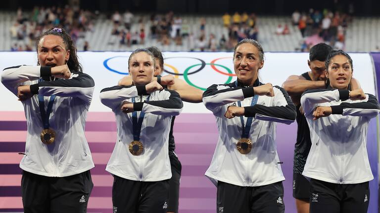 The Black Ferns Sevens team perform a haka after claiming the gold medal at the Olympics.