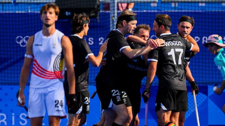 Black Sticks celebrate a goal against Belgium.