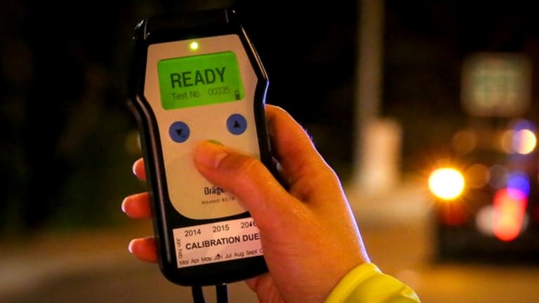 A breath test device ready for use.
