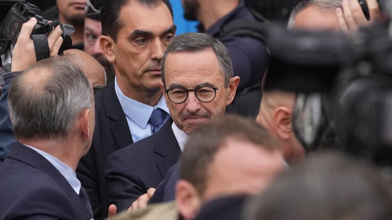Bruno Retailleau, head of the Conservative Party Les Republicains and outgoing Interior Minister, leaves after a meeting at the party headquarter.