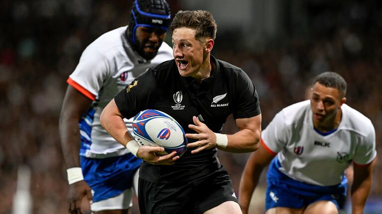 Cam Roigard makes a run against Namibia.