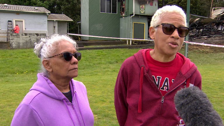 Camille Nakhid outside the charred remains of the famous clubhouse.