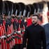Centre from left: Ukraine's President Volodymyr Zelensky, King Charles III and Major Ben Tracey inspecting a guard of honour at Windsor Castle, England, Friday, October 24, 2025.