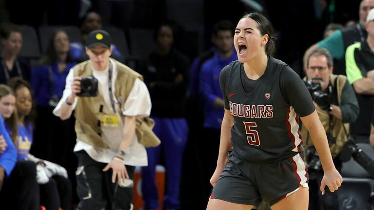 Charlisse Leger-Walker celebrates after winning the PAC-12 with Washington State.