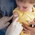 A child gets a vaccination (file photo)