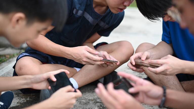 Children playing app-based games.