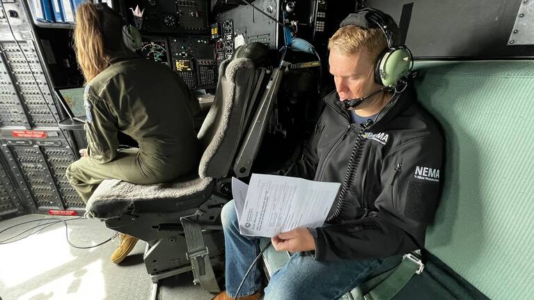 Chris Hipkins onboard a Defence Force plane.