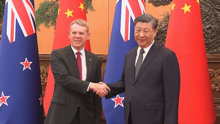 Chris Hipkins shakes hands with Xi Jinping in Beijing, 27 June.