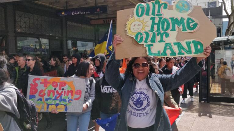 Protestors take part in a climate change strike on Auckland's Queen Street.