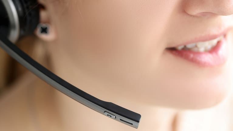 A person speaking on a helpline.