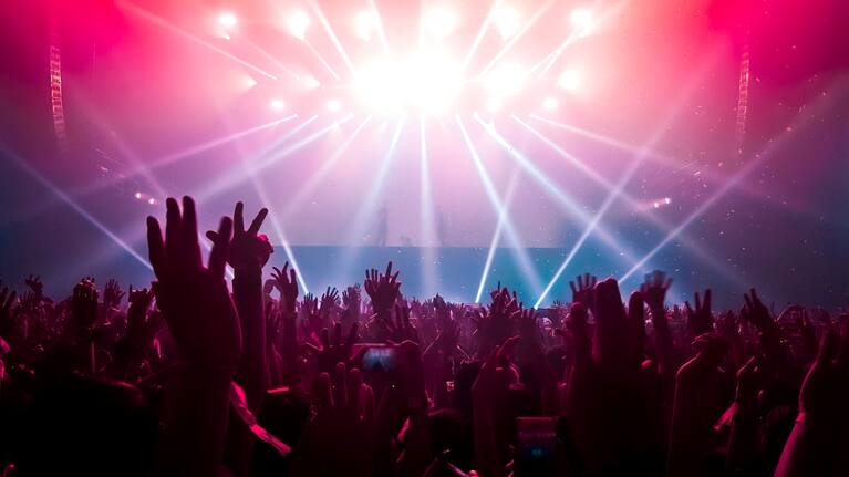 People dance at a music festival (file picture).