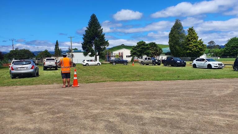 People line up to be tested for Covid-19 in Waimana.