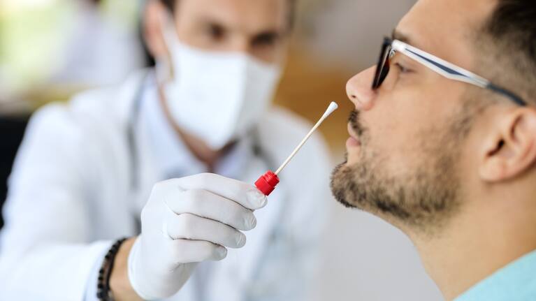 A man receiving a Covid-19 test.