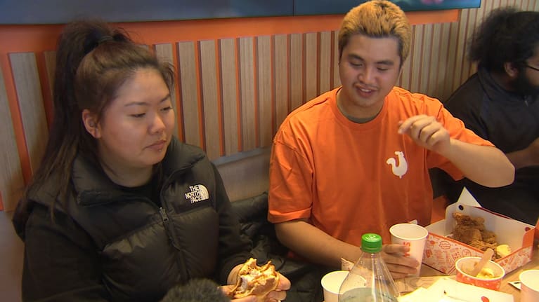 Customers eating at Popeyes