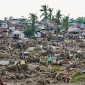Damaged homes beside Mananga Bridge in Talisay, Cebu Province, central Philippines. (Source: Malacanang Presidential Communications Office via AP)