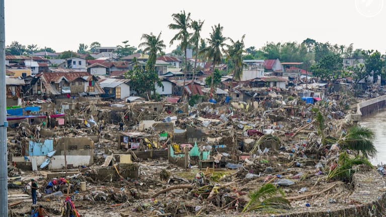 Damaged homes beside Mananga Bridge in Talisay, Cebu Province, central Philippines. (Source: Malacanang Presidential Communications Office via AP)