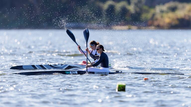 Dame Lisa Carrington and Aimee Fisher in their deciding race on Lake Karapiro.