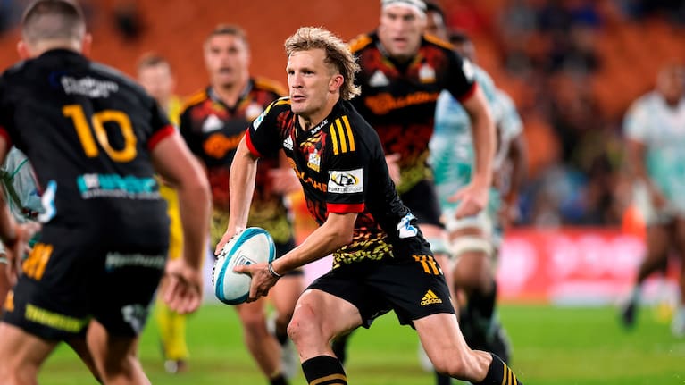 Chiefs playmaker Damian McKenzie leads his team's attack against the Drua at Waikato Stadium.