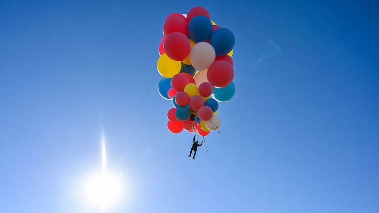 David Blaine floats into the sky.