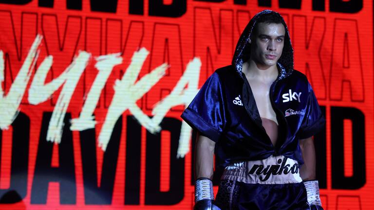 David Nyika makes his way to the ring to fight Anthony Carpin.