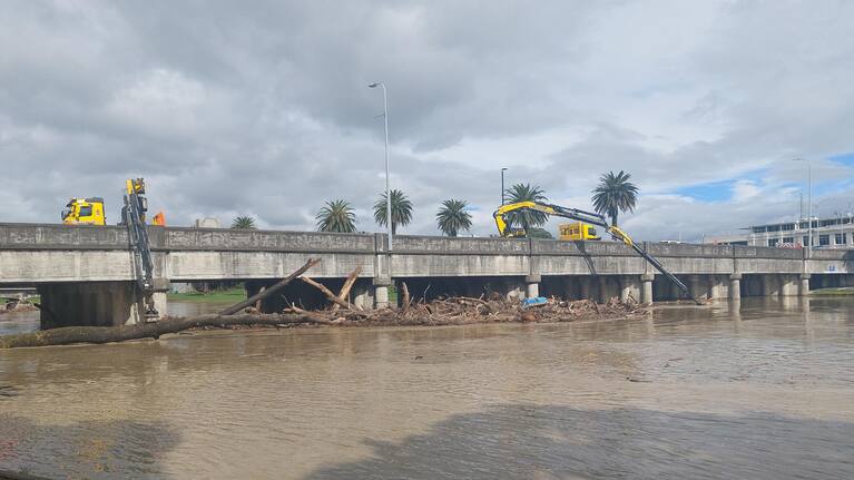 Diggers work to remove debris from Gisborne's Tūranganui River