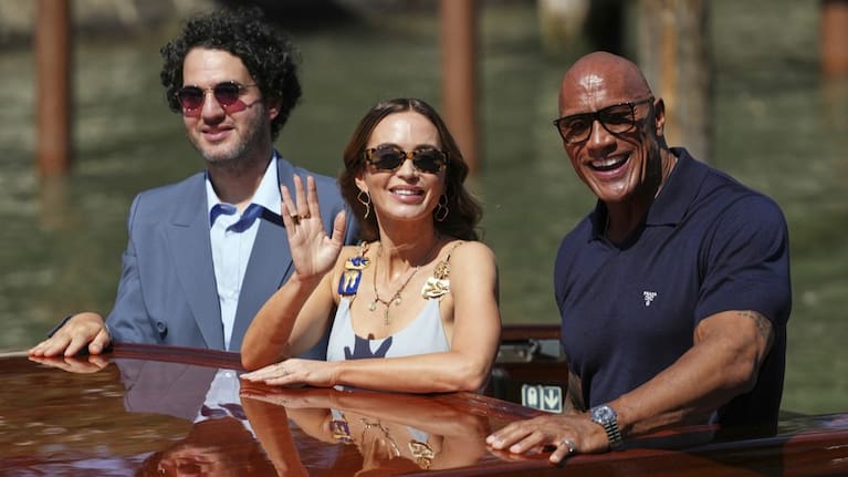 Director Benny Safdie, Emily Blunt and Dwayne Johnson arrive at the 82nd edition of the Venice Film Festival in Venice, Italy.