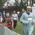 Crusaders players joined a record number of runners in Christchurch today to clock up 40,000 laps around a rugby ground.