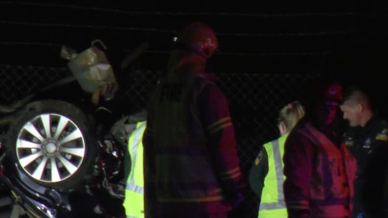 Fire and ambulance crews attend to a crash on Springs Rd.