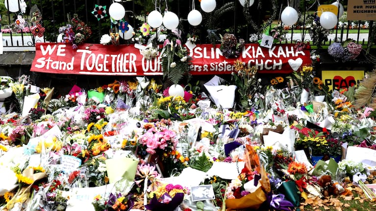 Flowers and tributes are laid at the Botanic Gardens on March 18, 2019.