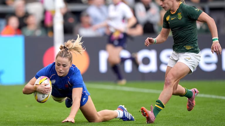 France's Joanna Grisez, left, scores their eighth try during the Women's Rugby World Cup 2025 pool D match between France and South Africa.