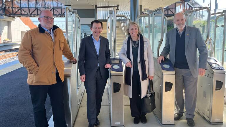 From left: Franklin Ward councillor Andy Baker, Transport Minister Simeon Brown, Franklin Local Board chair Angela Fulljames and Papakura Local Board chair Brent Catchpole celebrating at Pukekohe Station.