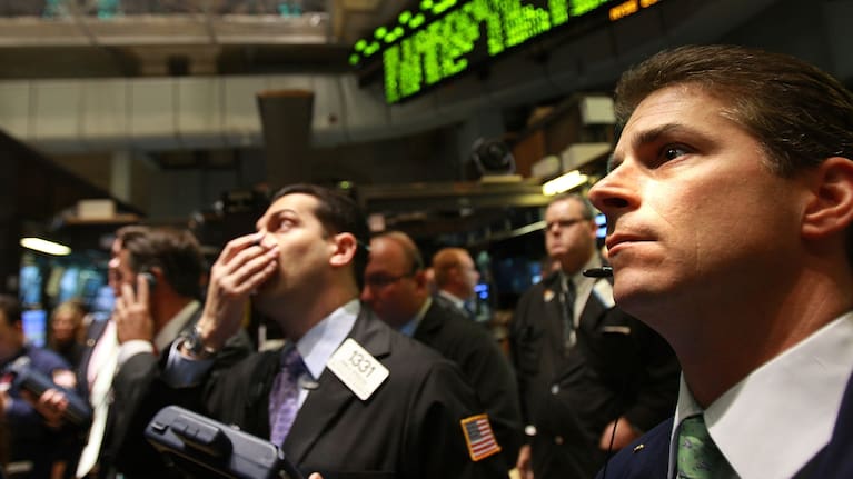 Traders work on the floor of the New York Stock Exchange moments after the opening bell October 13, 2008 .