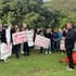 Green MP Chlöe Swarbrick and protesters on Waiheke Island.